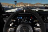 <p>A 12.0-inch digital instrument cluster and a steering wheel wrapped in leather and Alcantara are standard on all GT500s.</p>