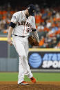 Houston Astros relief pitcher Ryan Pressly kicks the mound after giving up a two-RBI single to Washington Nationals' Asdrubal Cabrera during the seventh inning of Game 2 of the baseball World Series Wednesday, Oct. 23, 2019, in Houston. (AP Photo/Matt Slocum)