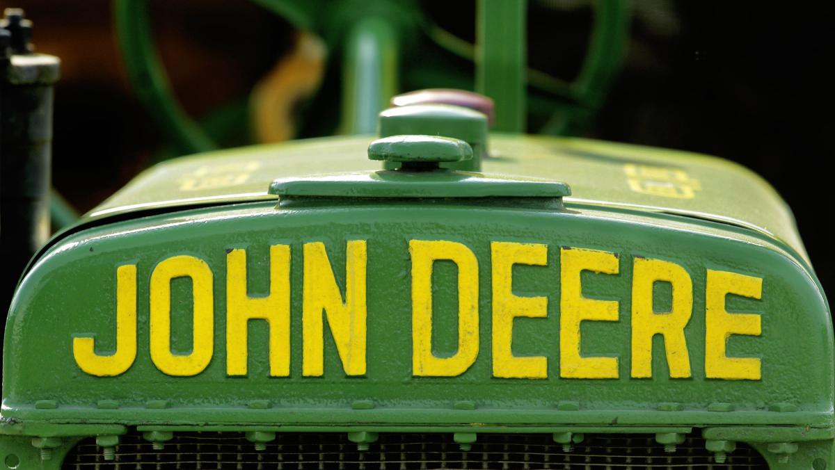 Deere Shares Tumble After the Farm Equipment Maker's 2024 Guidance Misses  Estimates