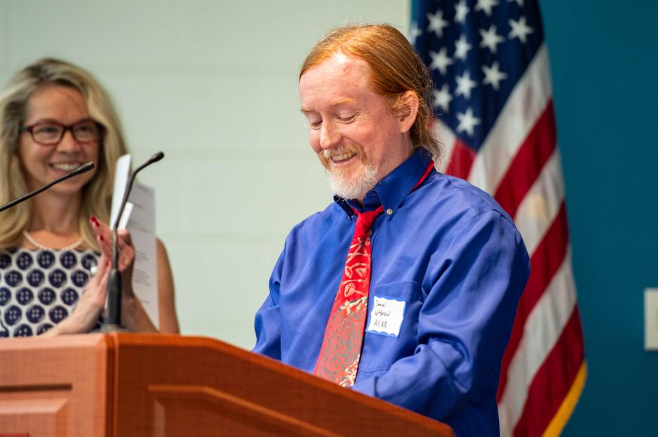 Daniel Withrow, president of the Asheville City Association of Educators, speaks before a Asheville City Schools Board of Education Candidate Forum at A-B Tech on April 22, 2022.