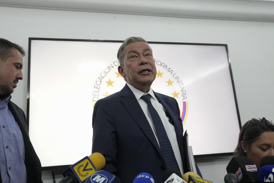 Gerardo Blyde, a leader in the opposition's delegation of the unitary platform for negotiation, speaks to the press in Caracas, Venezuela, Monday, Feb. 19, 2024. (AP Photo/Ariana Cubillos)