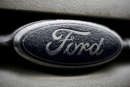 FILE PHOTO: Snowflakes are seen on the badge of a Ford car in Warsaw, Poland, December 17, 2016. REUTERS/Kacper Pempel