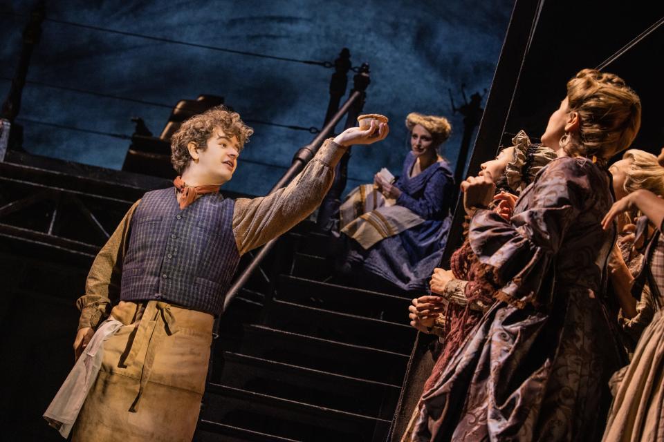 Gaten Matarazzo, left, and Annaleigh Ashford in a scene from "Sweeney Todd."