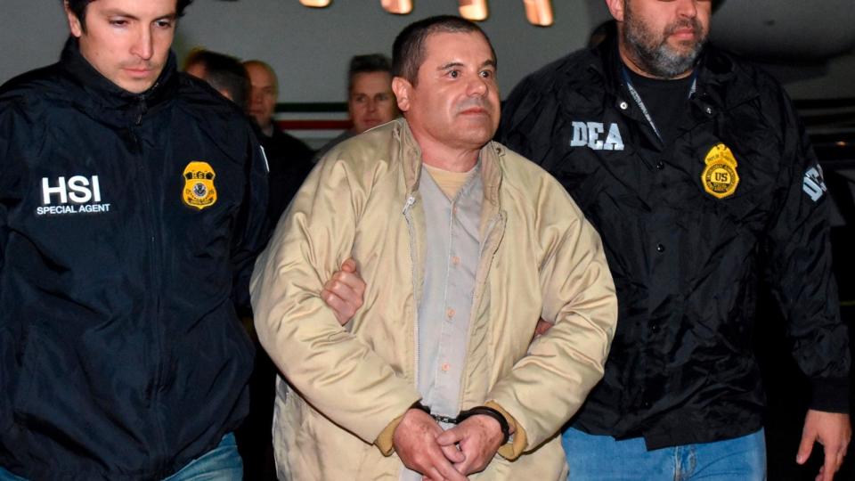 PHOTO: In this Jan. 19, 2017 file photo provided U.S. law enforcement, authorities escort Mexican drug lord Joaquin 'El Chapo' Guzman, center, from a plane in Ronkonkoma, N.Y. (AP, File)