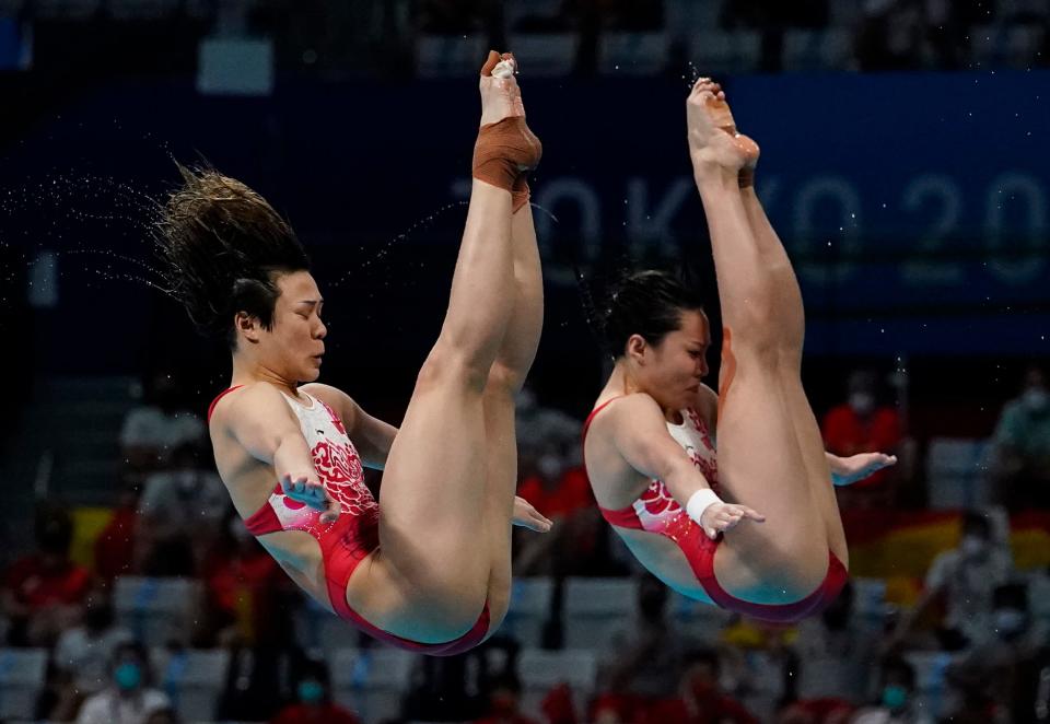 Shi Tingmao and Wang Han (CHN) during the women's synchronized 3m springboard diving competition on Sunday, July 25, 2021, during the Tokyo 2020 Olympic Summer Games at Tokyo Aquatics Centre in Tokyo, Japan.