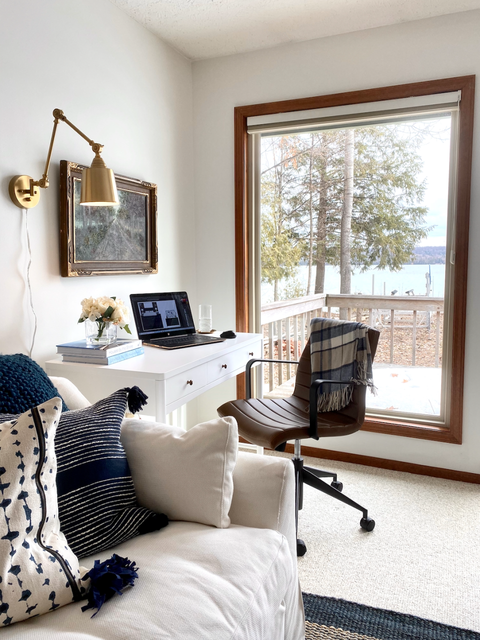 Position the desk so you can see outside—you’ll get the benefit of natural light and a pretty view. (Photo: Havenly)