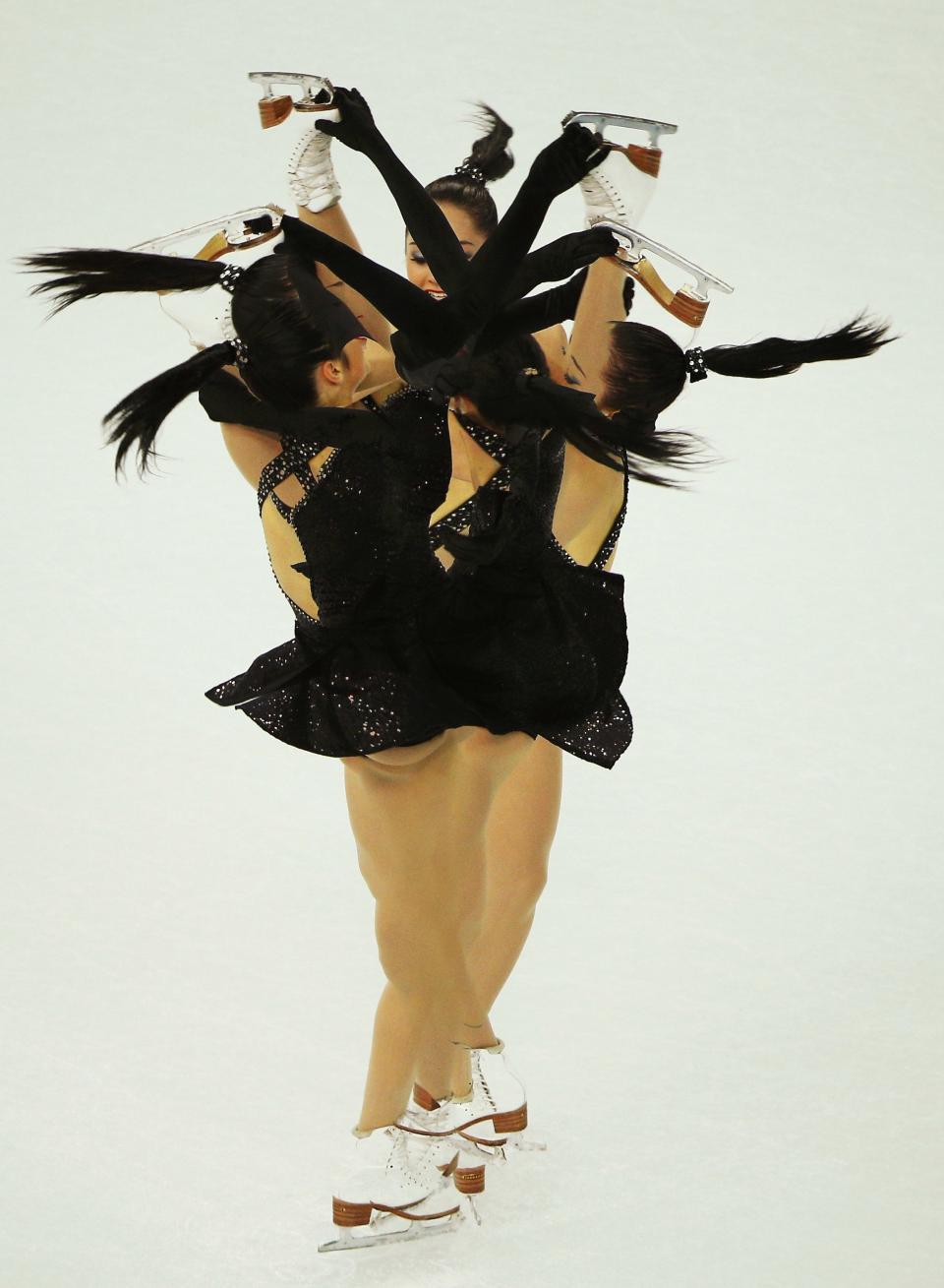 Kaetlyn Osmond of Canada competes during the Team Ladies Short Program at the Sochi 2014 Winter Olympics, February 8, 2014. Picture taken with multiple exposures. REUTERS/Brian Snyder