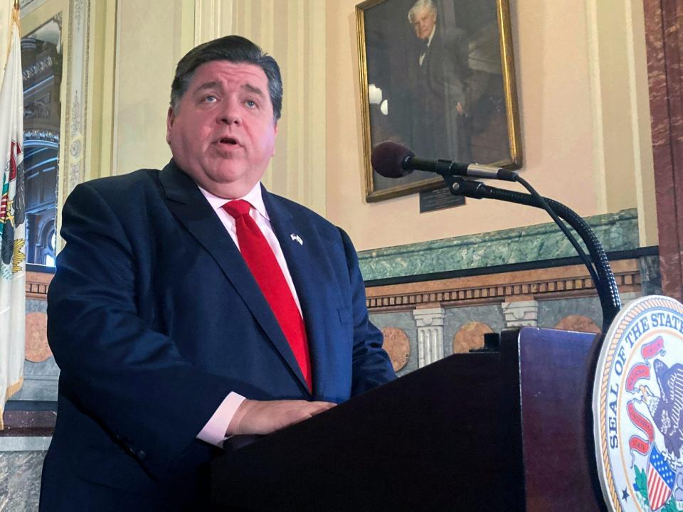 Illinois Gov. J.B. Pritzker addresses reporters on April 7, 2022, in Springfield, Illinois, about a budget deal reached among Democrats.