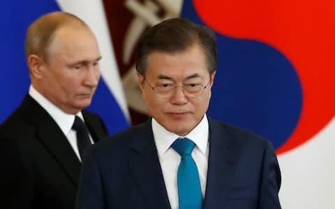 Moon Jae-in held talks with Vladimir Putin, the Russian president, at the weekend - Credit: Sergei Karpukhin/Reuters