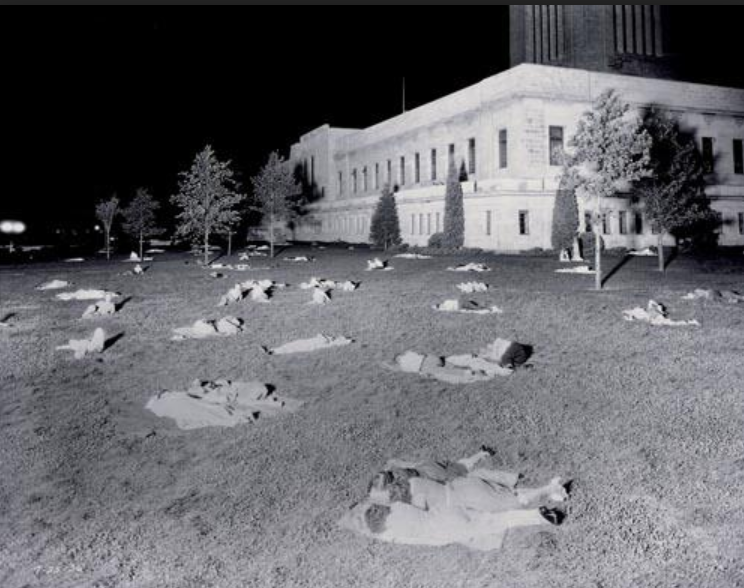 People try to sleep on the Capitol grounds in Lincoln, Nebraska.