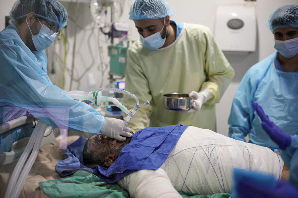 Medical staff members attend to a patient, a casualty of an Isareli airstrike, in the ICU of the Geitaoui Hospital's burns unit, in Beirut, Lebanon, Oct. 8, 2024. / Credit: Louisa Gouliamaki/REUTERS