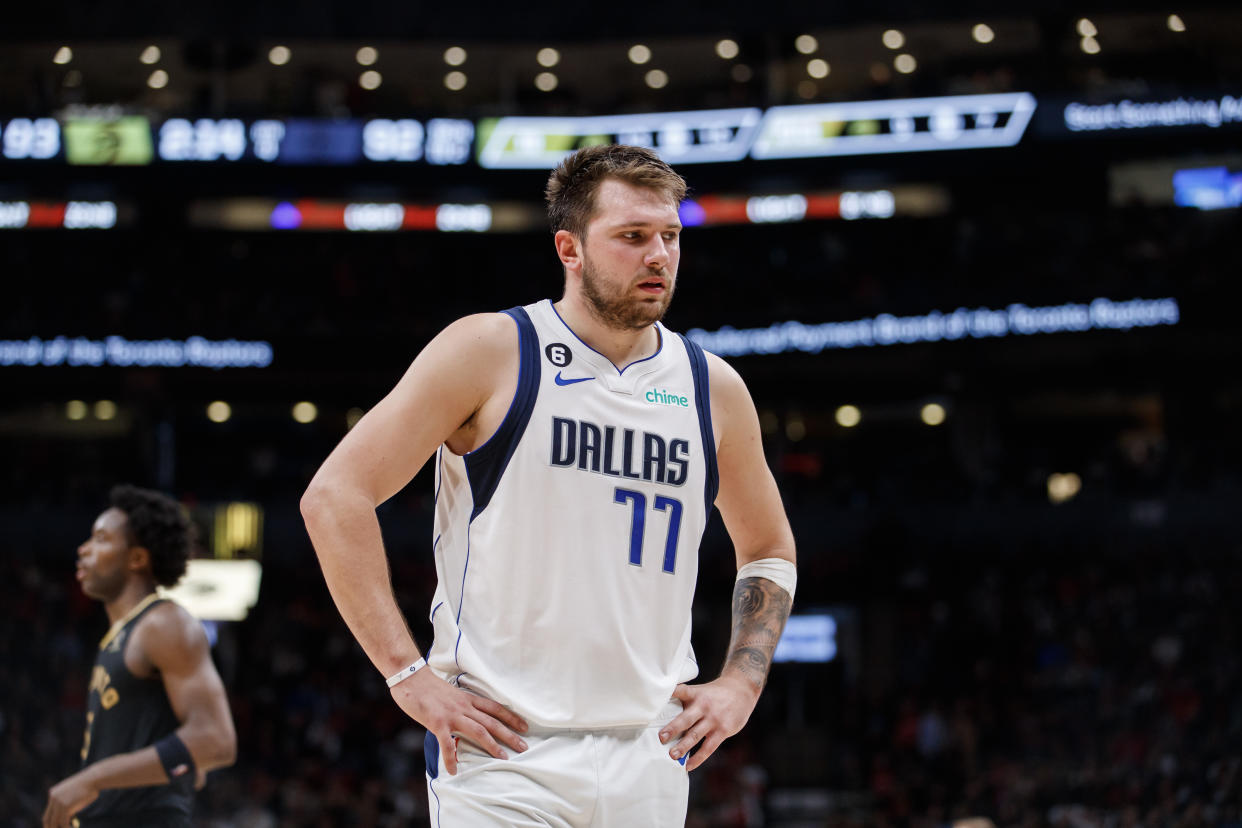 TORONTO, ON - NOVEMBER 26: Luka Doncic #77 of the Dallas Mavericks walks to the bench during second half of their NBA game against the Toronto Raptors at Scotiabank Arena on November 26, 2022 in Toronto, Canada. NOTE TO USER: User expressly acknowledges and agrees that, by downloading and or using this photograph, User is consenting to the terms and conditions of the Getty Images License Agreement. (Photo by Cole Burston/Getty Images)