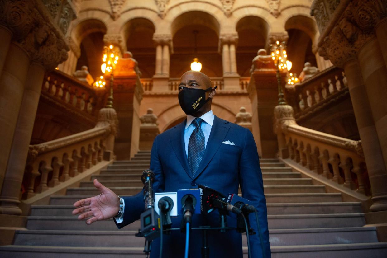 New York City Mayor Eric Adams speaks to reporters at the State Capitol in Albany on Monday, February 14, 2022.