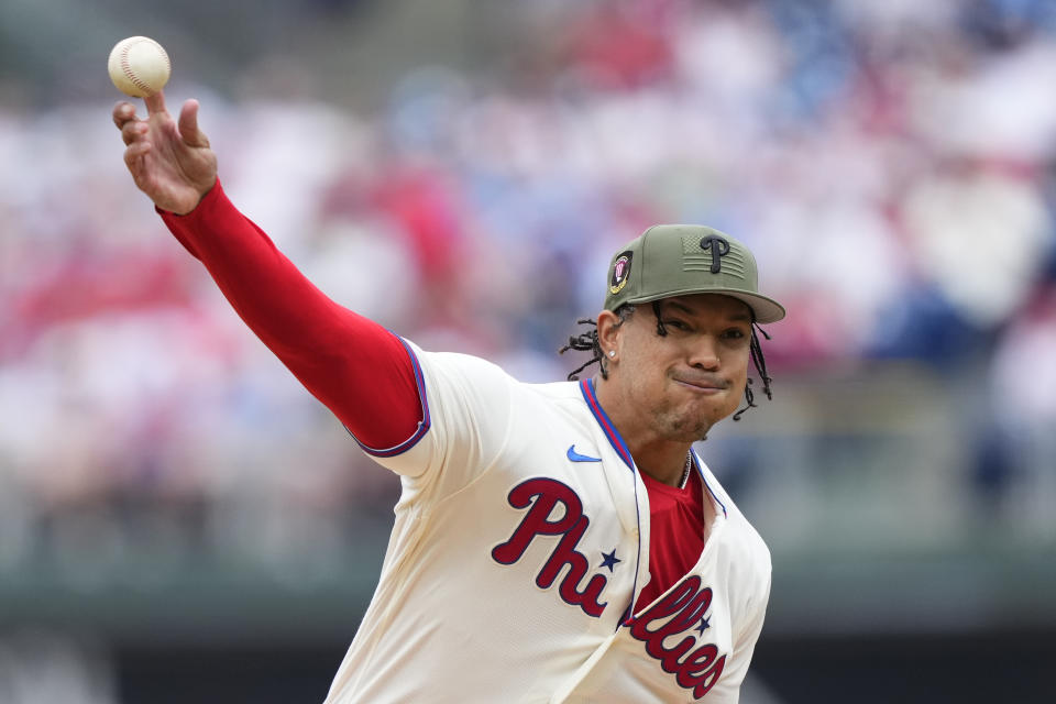 Philadelphia Phillies' Taijuan Walker pitches during the first inning of a baseball game against the Chicago Cubs, Sunday, May 21, 2023, in Philadelphia. (AP Photo/Matt Rourke)