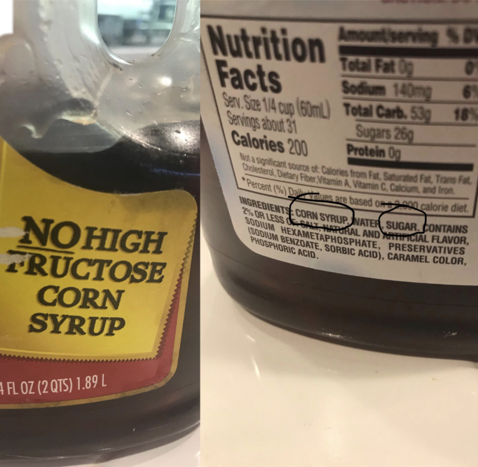 Syrup bottle labeled "No High Fructose Corn Syrup" next to its Nutrition Facts label that lists "corn syrup" and "sugar"