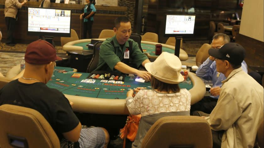 HAWAIIAN GARDENS CA. AUGUST 23, 2016: Card players try their luck at The Gardens Casino in Hawaiian Gardens on August 23, 2016. The Gardens Casino has undergone a $90-million overhaul and expansion. The card club previously operated out of a smaller tent. The tiny city of Hawaiian Gardens hopes the new card club will bring it added revenue. (Glenn Koenig/ Los Angeles Times)