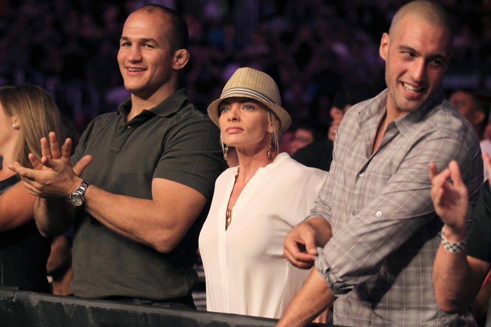 Junior Dos Santos and actress Jaime Pressly enjoy a UFC on Fox event at Staples Center on Saturday, Aug. 4, 2012, in Los Angeles. (Photo by Matt Sayles/Invision/AP Images)