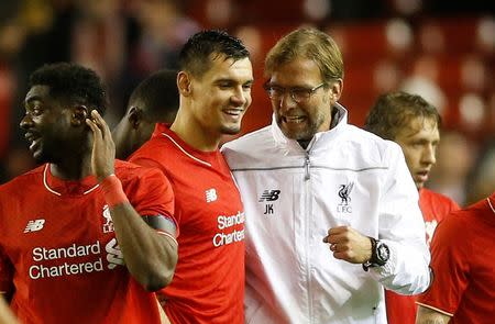 Football Soccer - Liverpool v FC Girondins de Bordeaux - UEFA Europa League Group Stage - Group B - Anfield, Liverpool, England - 26/11/15 Liverpool manager Juergen Klopp celebrates with Dejan Lovren at the end of the match Action Images via Reuters / Carl Recine