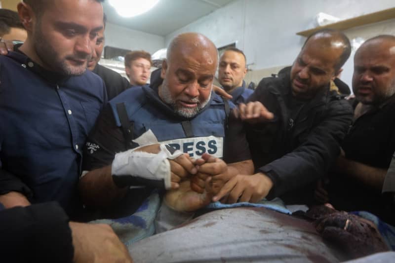 Wael Dahdouh, Al-Jazeera bureau chief in Gaza, mourns over the body of his dead son Hamza, who also worked as a journalist for Al Jazeera and was killed in an Israeli air strike on Rafah. Dahdouh has previously lost his wife, two other children and a grandson and was injured himself during the war. Mohammed Talatene/dpa