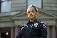 In this Aug. 5, 2019, photo, Portland Police Chief Danielle Outlaw poses for a photo in Portland, Ore. "I don’t want for one minute anyone to think that because we’re being thrust into this political show, that I or the public have lost confidence in (police officers') ability to do what we do," said Police Chief Danielle Outlaw, who is regularly heckled as she leaves City Hall by those who feel the police target counterprotesters for arrest over far-right demonstrators. (AP Photo/Craig Mitchelldyer)
