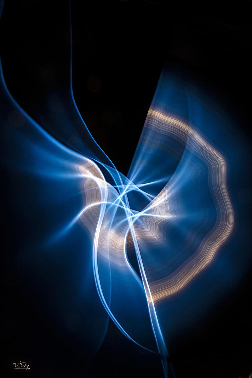 This image was produced by using a single side-lit blue plastic-coated wire.