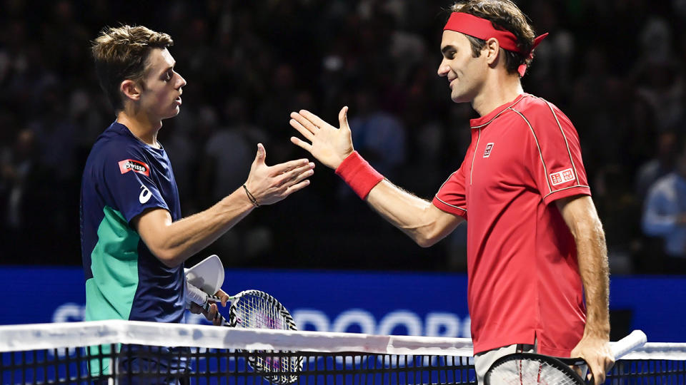 Roger Federer and Alex De Minaur, pictured here after their clash in the Basel final.