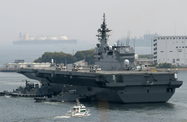 Japan on May 1 dispatched its biggest warship since World War II to protect a US supply ship, one of the country's military roles expanded under Prime Minister Shinzo Abe, as tensions mount in the region over North Korea