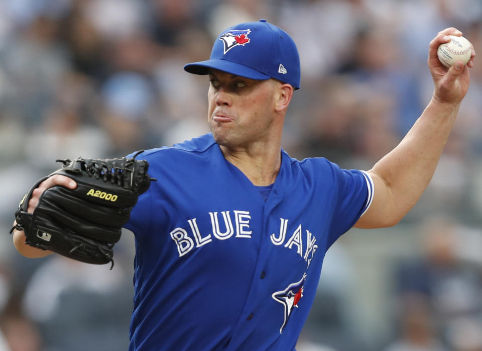 Toronto Blue Jays starting pitcher Clayton Richard winds up during the first inning of the team's baseball game against the New York Yankees, Tuesday, June 25, 2019, in New York. (AP Photo/Kathy Willens)