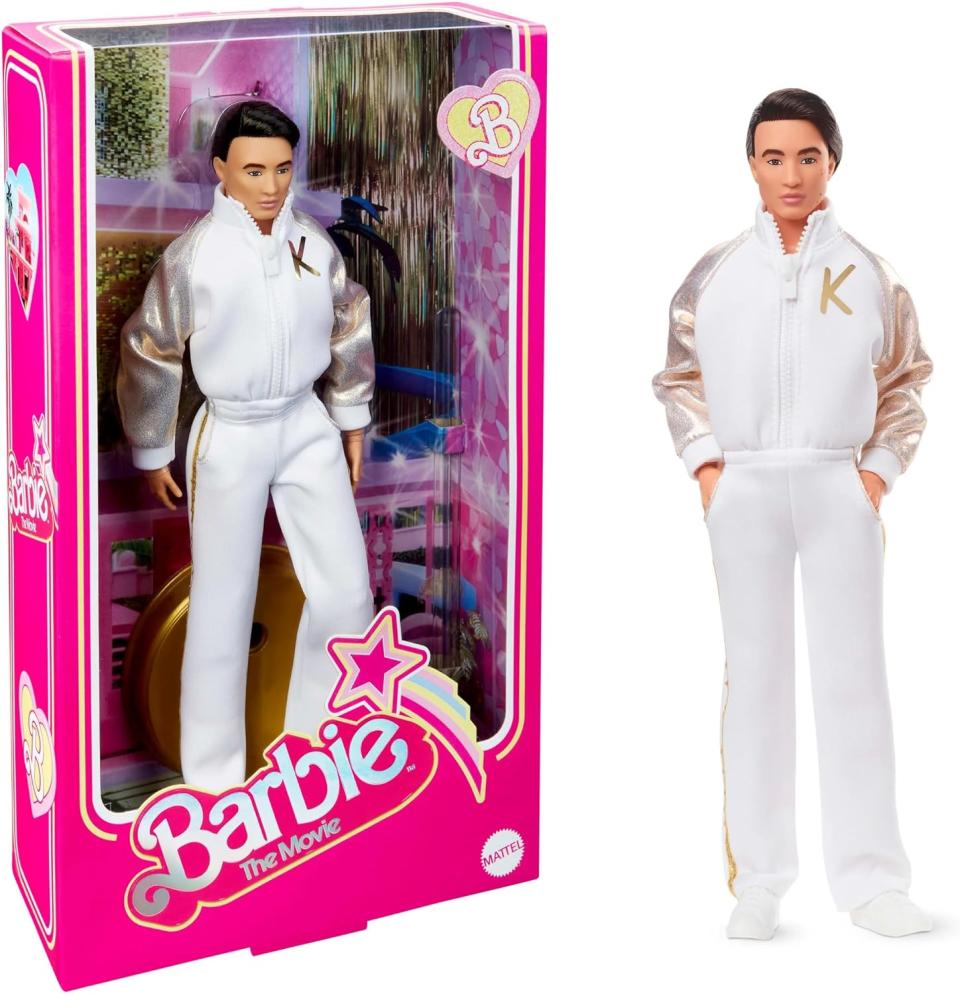 ken doll wearing white and gold jumpsuit