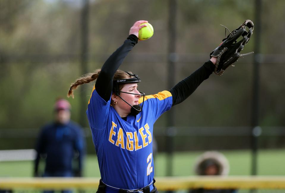 Irondequoit pitcher Kailey Besio delivers a pitch against Mendon in 2023.