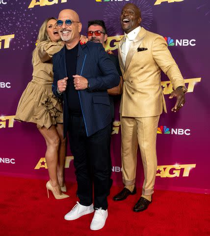 <p>Amanda Edwards/Getty</p> Heidi Klum, Howie Mandel, Simon Cowell and Terry Crews