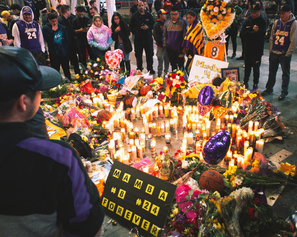 Fans gather outside of the Staples Center in Los Angeles to mourn Los Angeles Lakers legend Kobe Bryant. (Photo: Joseph Gray)