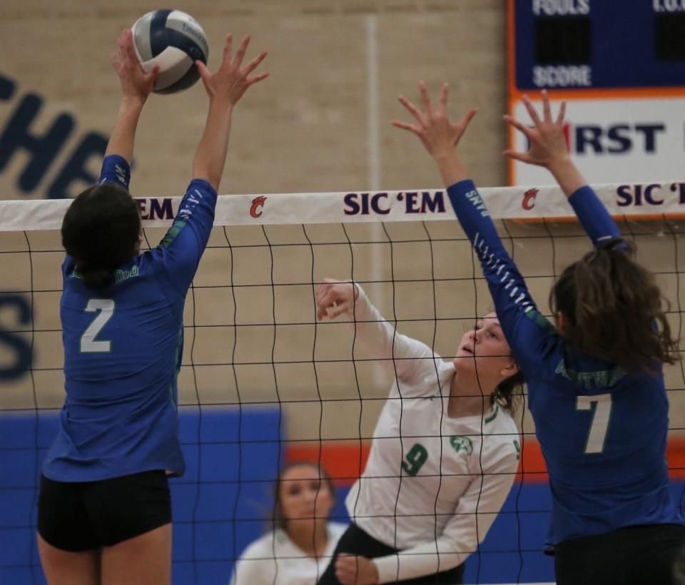 Wall High School's Erin Morrison, 9, tries to drive the ball past El Paso Montwood during the Gold Division third-place match of the Nita Vannoy Memorial Volleyball Tournament at Babe Didrikson gym on Saturday, Aug. 20, 2022.