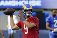 Los Angeles Rams quarterback Matthew Stafford throws during NFL football camp Thursday, June 10, 2021, in Inglewood, Calif. (AP Photo/Marcio Jose Sanchez)