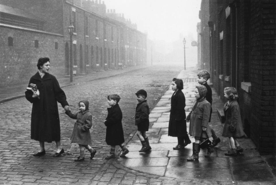 A teacher leads a young class across the street in 'Teachers', 1956 (Bert Hardy/Getty Images)