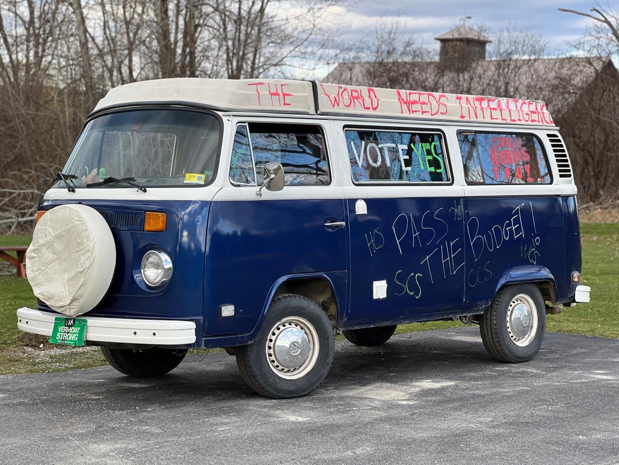 A decorated VW bug encourages Williston and other residents of the Champlain Valley School District to pass the school budget on the second round of voting on Tuesday, April 16, 2024. Vermont's largest school district serving the towns of Charlotte, Hinesburg, Shelburne, St. George and Williston held its first revote in history in the wake of soaring education property taxes.