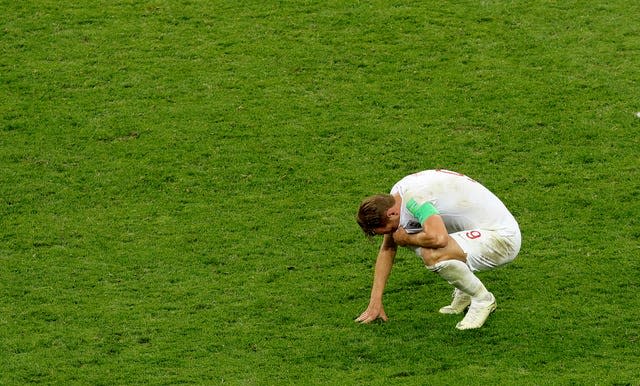 A dejected Harry Kane after the final whistle signals World Cup semi-final defeat by Croatia