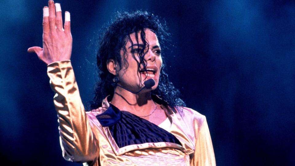 Mandatory Credit: Photo by Ilpo Musto/Shutterstock (499656cu)MICHAEL JACKSON PERFORMING IN LONDON - 1997Various.