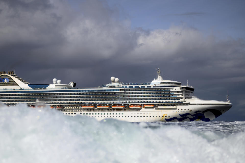 Carrying multiple people who have tested positive for COVID-19, the Grand Princess maintains a holding pattern about 30 miles off the coast of San Francisco, Sunday, March 8, 2020. The cruise ship is scheduled to dock at the Port of Oakland on Monday. (AP Photo/Noah Berger)