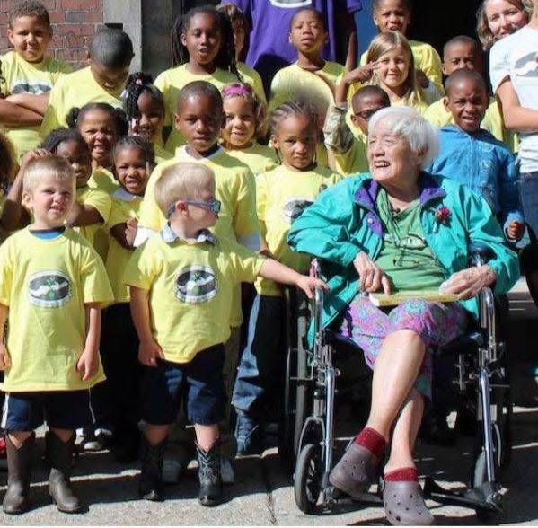 The history of The James and Grace Lee Boggs School includes "Boggs Day" in 2013, when students had a chance to get close to one of the inspirations for the Detroit school, the late Grace Lee Boggs (seated).