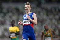 Karsten Warholm, of Norway, wins a men's 400-meter hurdles semifinal at the 2020 Summer Olympics, Sunday, Aug. 1, 2021, in Tokyo. (AP Photo/Petr David Josek)