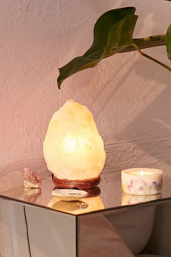 Get it <a href="https://www.urbanoutfitters.com/shop/himalayan-salt-lamp?adpos=1o5&amp;cm_mmc=SEM-_-Google-_-PLA-_-371314651656_product_type_apartment_product_type_furniture_product_type_lighting&amp;color=080&amp;creative=209973868071&amp;device=c&amp;gclid=CjwKCAiA15vTBRAHEiwA7Snfc8x51CsP2W3JuLPDXeLYzGaK64ZSMoqCWnXQjoKiahsskQVR_VBugxoCkSEQAvD_BwE&amp;inventoryCountry=US&amp;matchtype=&amp;mrkgadid=3247931991&amp;mrkgcl=671&amp;network=g&amp;product_id=44157220&amp;rkg_id=h-3fefc698f67eb1d5fa9587121bab3bf5_t-1516729624&amp;utm_campaign=Google&amp;utm_content=371314651656_product_type_apartment_product_type_furniture_product_type_lighting&amp;utm_medium=paid_search&amp;utm_source=SEM&amp;utm_term=GSC%202.0%20-%20Apartment%26Music" target="_blank">here</a>.