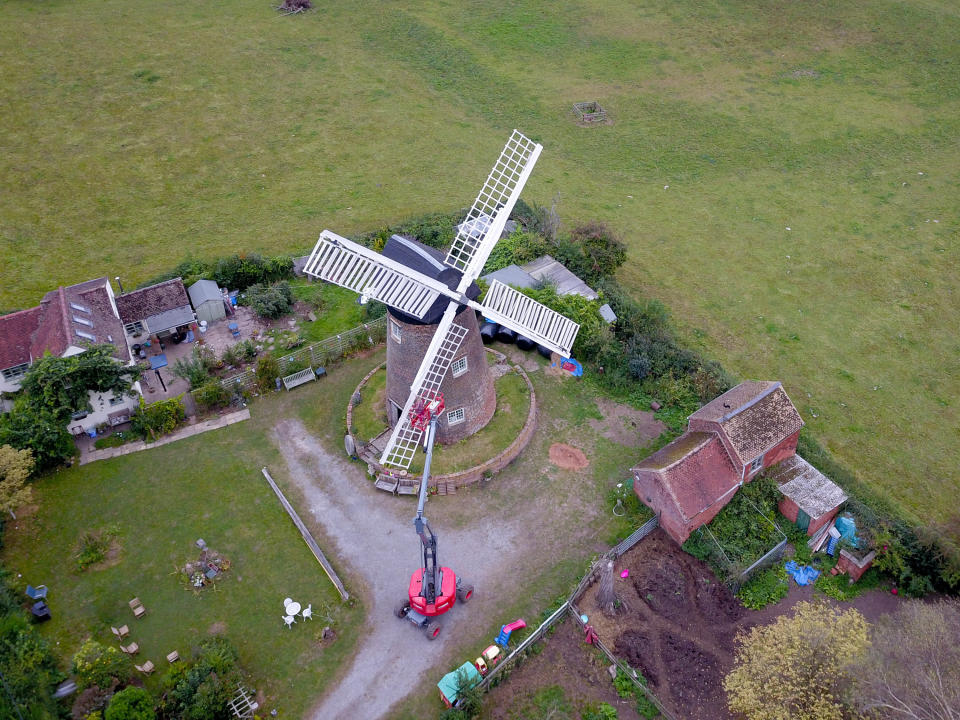 A homeowner has completed the ultimate lockdown DIY project at one of Britain's last fully-working windmills - after using a cherry picker to paint the sails by hand. Jeanette McGarry, 58, painstakingly spent three weeks touching up the paintwork on the gigantic five tonne sails as part of a refurbishment of historic Berkswell Windmill. The 70ft tall Grade II-listed building has been standing for nearly 200 years in the village of Balsall Common, West Mids., and was bought by Jeannette in 2005. She then spent £200,000 restoring the 19th century four-bladed tower mill to its former glory with the help of English Heritage after it fell into a state of disrepair.