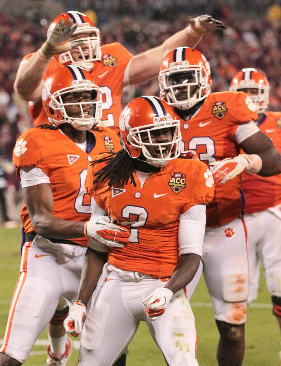 Clemson wide receiver Sammy Watkins (2) celebrates his 53-yard third quarter touchdown catch with Clemson wide receiver DeAndre Hopkins (6), left, and Clemson tight end Dwayne Allen (83), right, in the ACC Championship game at Bank of America Stadium in Charlotte, N.C. in 2011. Hopkins, a D.W. Daniel High graduate, is current one of the top receivers in the NFL with the Houston Texans after playing at Clemson. 