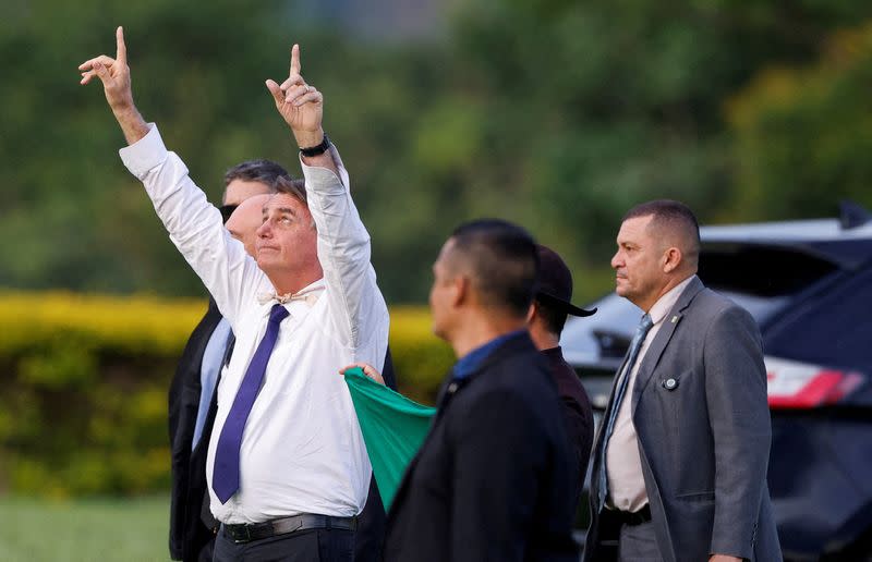 FILE PHOTO: Brazil's President Bolsonaro meets supporters at the Alvorada Palace, in Brasilia