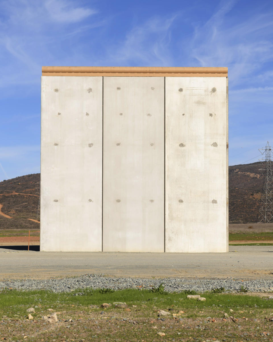 A border wall prototype stands in San Diego near the Mexico-U.S. border, seen from Tijuana, Mexico, Saturday, Dec. 22, 2018. (AP Photo/Daniel Ochoa de Olza)