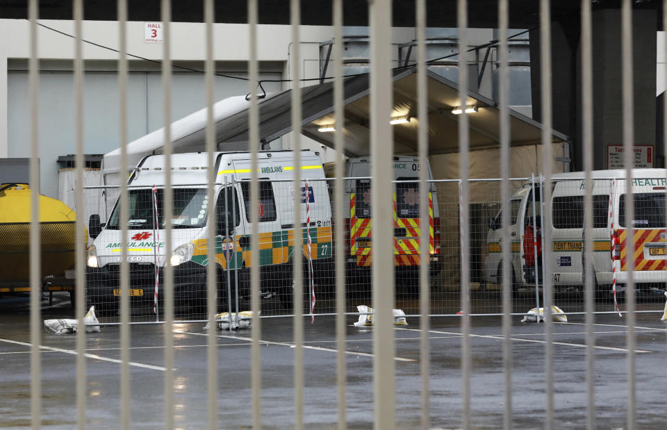 Ambulances are parked outside the COVID-19 field hospital created in the International Convention Centre in Cape Town, South Africa, Monday, June 29, 2020. South Africa’s reported coronavirus are surging. Its hospitals are now bracing for an onslaught of patients, setting up temporary wards and hoping advances in treatment will help the country’s health facilities from becoming overwhelmed. (AP Photo/Nardus Engelbrecht)
