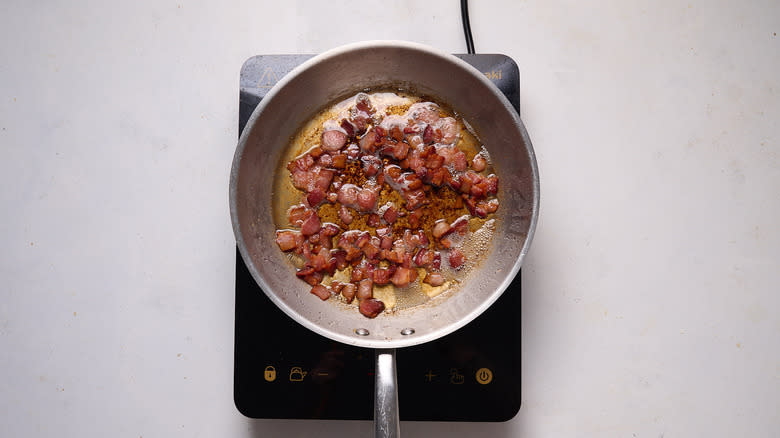cooked bacon in skillet