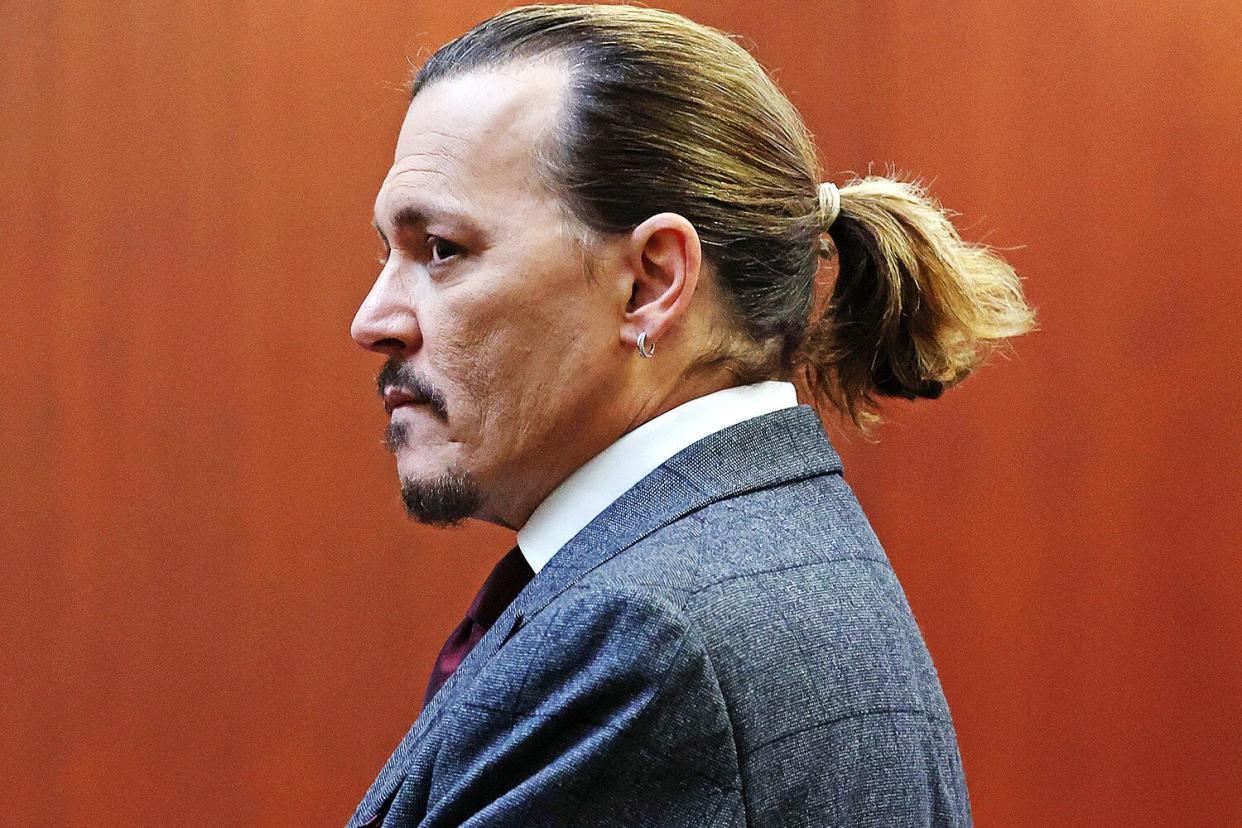 US actor Johnny Depp arrives at the start of the day during the 50 million US dollar Depp vs Heard defamation trial at the Fairfax County Circuit Court in Fairfax, Virginia, on April 28, 2022. - US actor Johnny Depp sued his ex-wife Amber Heard for libel in Fairfax County Circuit Court after she wrote an op-ed piece in The Washington Post in 2018 referring to herself as a "public figure representing domestic abuse." (Photo by Michael REYNOLDS / POOL / AFP) (Photo by MICHAEL REYNOLDS/POOL/AFP via Getty Images)