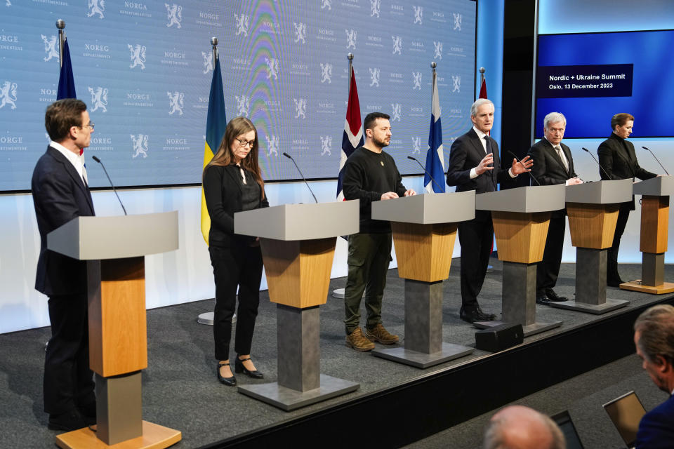 Ukrainian President Volodymyr Zelenskyy, third from left, attends the Nordic Summit with, from left, Sweden's Prime Minister Ulf Kristersson, Iceland's Prime Minister Katrín Jakobsdóttir, Norway's Prime Minister Jonas Gahr Støre, Finland's President Sauli Niinistö and Denmark's Prime Minister Mette Frederiksen, in Oslo, Wednesday, Dec. 13, 2023. (Cornelius Poppe/NTB Scanpix via AP)